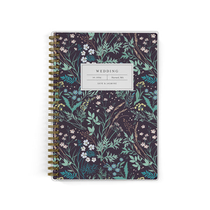 Our inclusive gender-neutral LGBT Mini Wedding Planners are perfect for planning a small wedding or elopement, shown in a black wildflower pattern