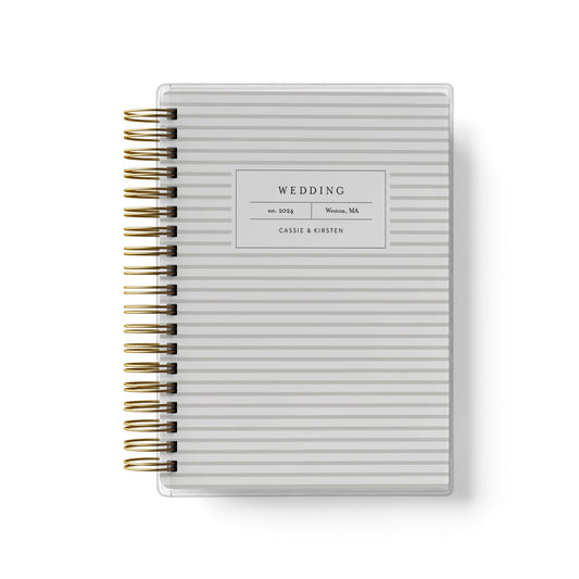 Shown in a mini stripe design, our exclusive LGBT wedding planner books are all-inclusive and gender-neutral