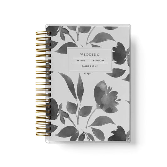 Shown in a watercolor floral design, our exclusive LGBT wedding planner books are all-inclusive and gender-neutral