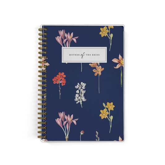 Shown in a grandmillennial inspired dark botanical print, Mother of the Bride planners are exclusive to Wicked Bride.