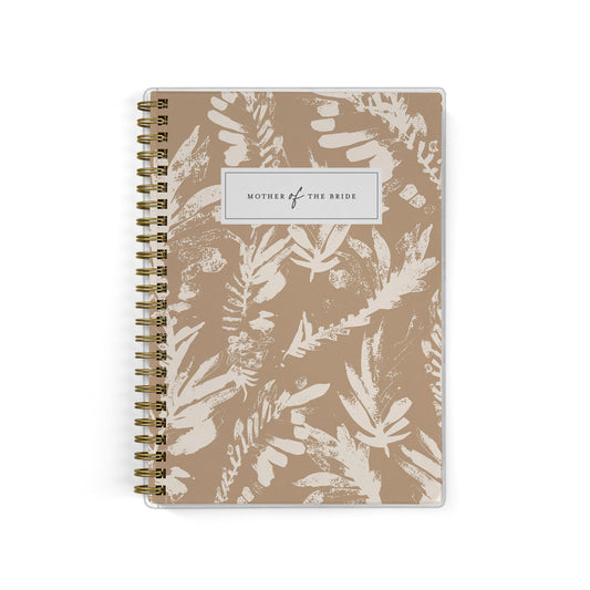 Shown in a neutral boho leaf print, Mother of the Bride planners are exclusive to Wicked Bride.
