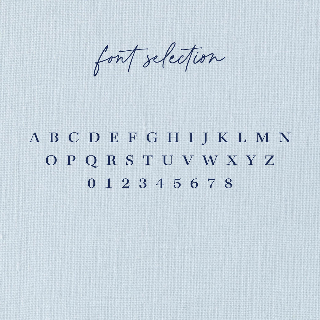 Custom return address stamp in a delicate ribbon bow design