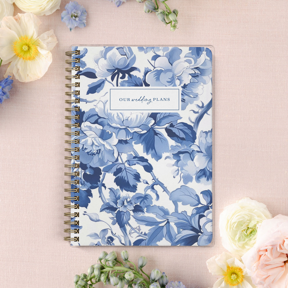 Our exclusive mini wedding planners are perfect for planning small weddings and elopements, shown in a blue toile cabbage rose print