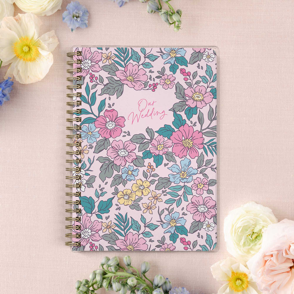 Our exclusive mini wedding planners are perfect for planning small weddings and elopements, shown in a colorful garden floral design.