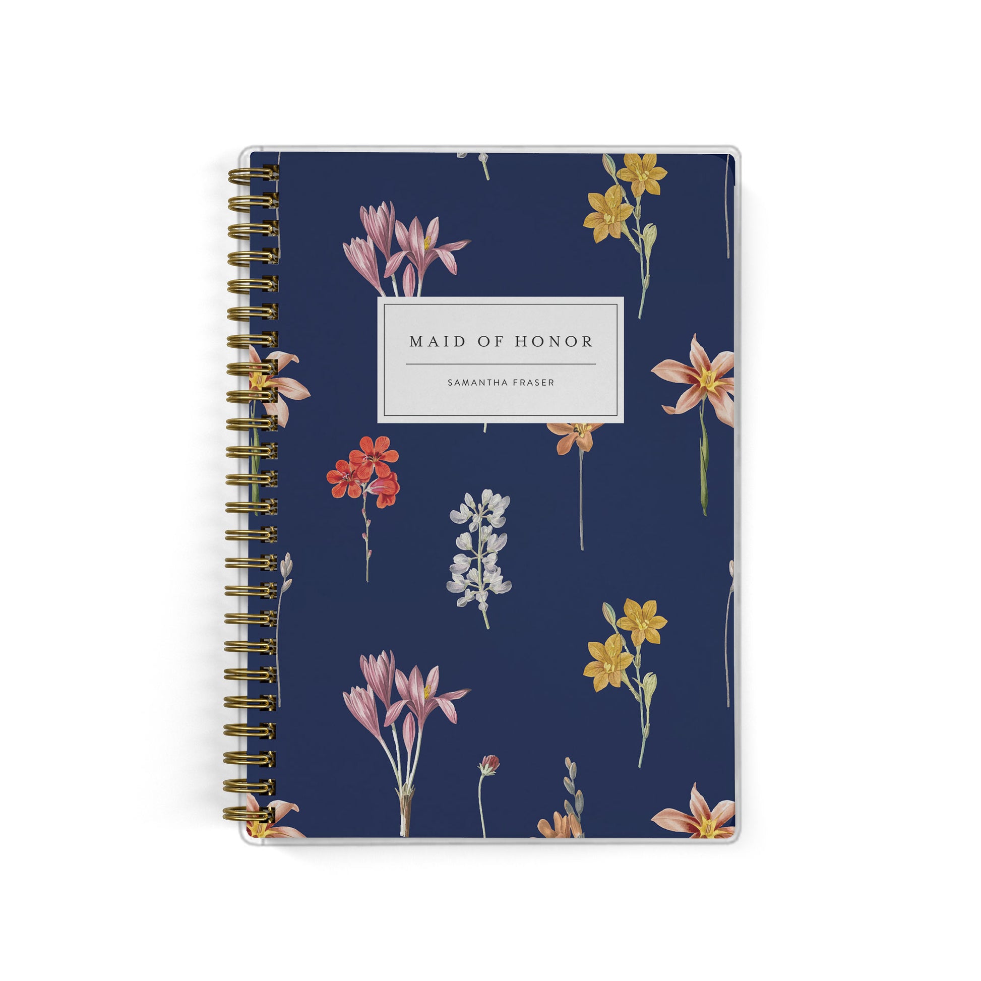 Our exclusive maid of honor planners are the perfect gift for your best friend, shown in a dark floral botanical print