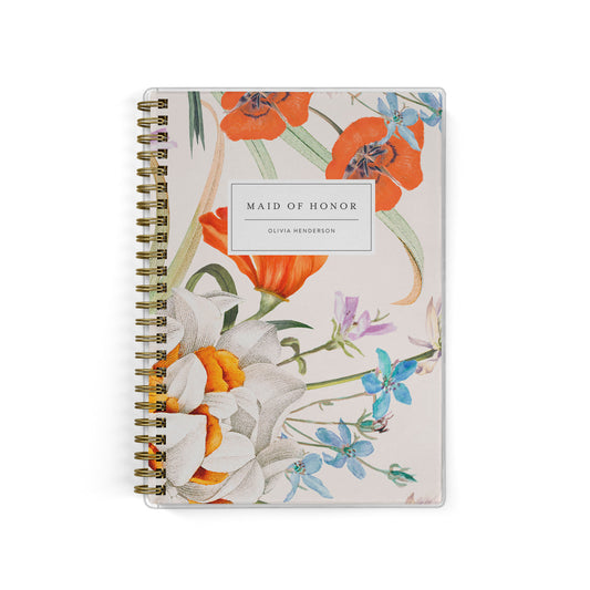 Our exclusive maid of honor planners are the perfect gift for your best friend, shown in a vintage floral botanical print