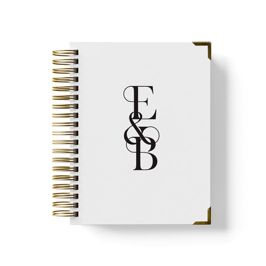 Our luxury wedding planner books are the best a bride can buy, featured in a bold monogram design