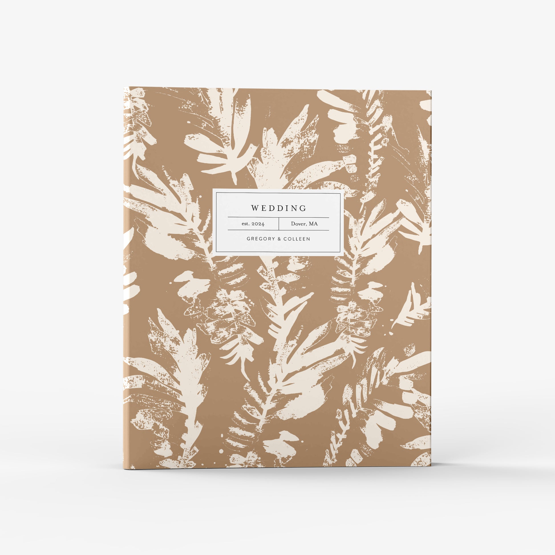 Our wedding binders are the perfect planning tool, shown in a neutral boho leaf pattern