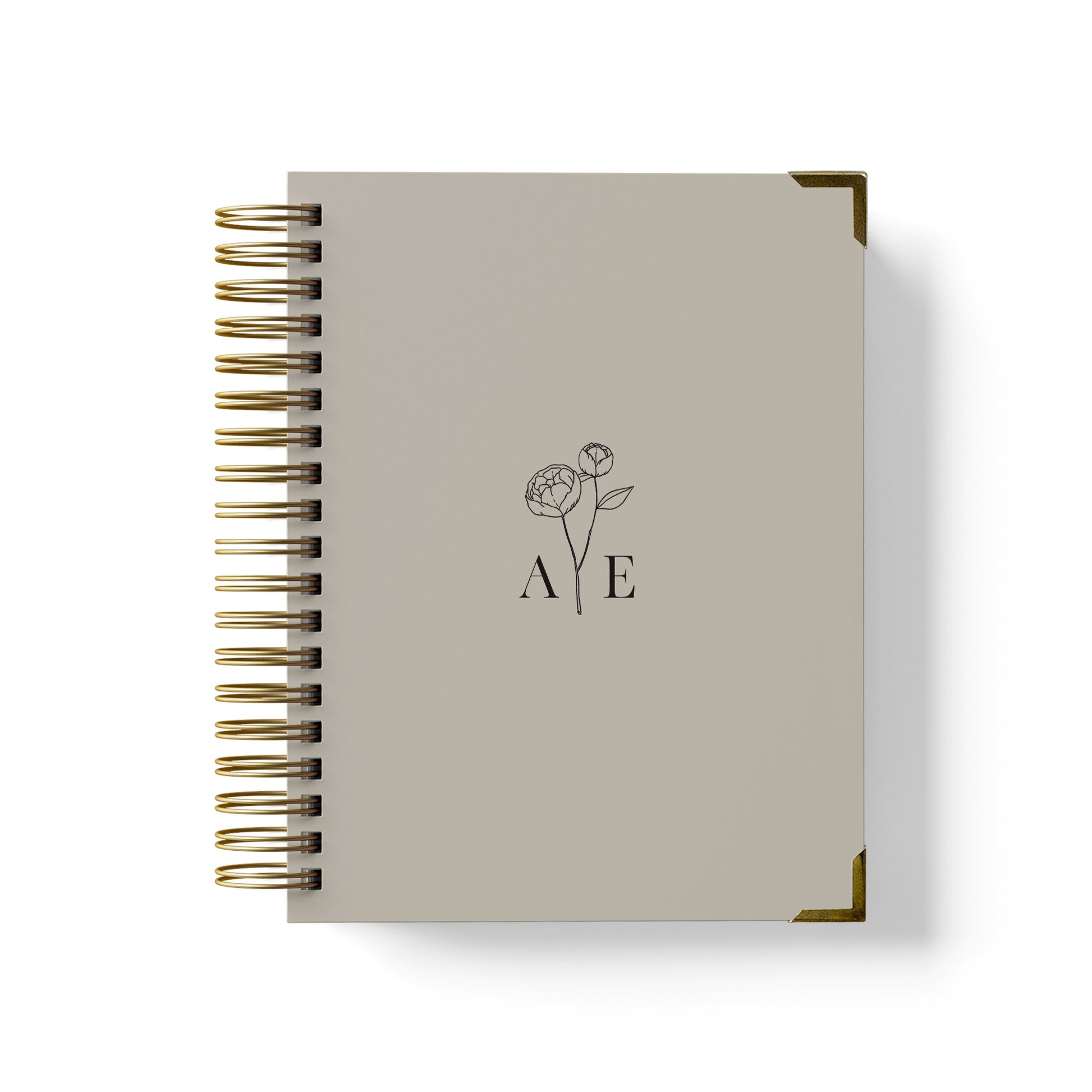 Our luxury wedding planner books are the best a bride can buy, featuring a delicate peony stem with monogram