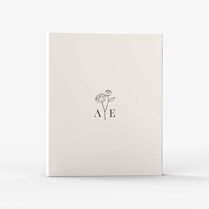 Our wedding binders are the perfect planning tool, shown in a delicate peony monogram design