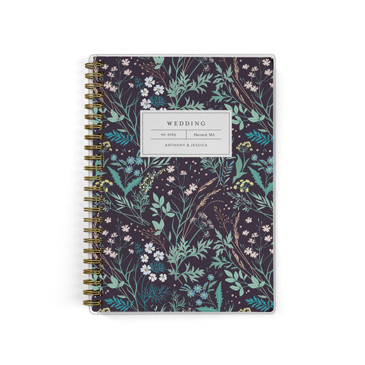 Our exclusive mini wedding planners are perfect for planning small weddings and elopements, shown in a black wildflower pattern