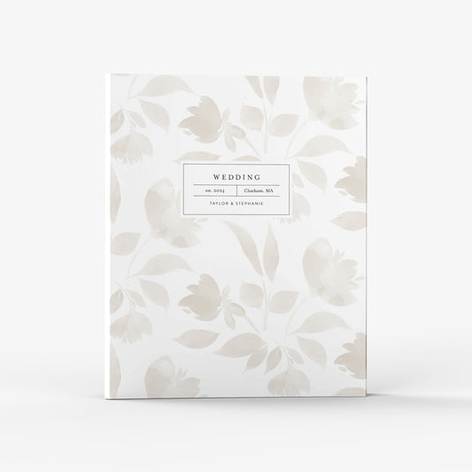 Our wedding binders are the perfect planning tool, shown in a watercolor floral design