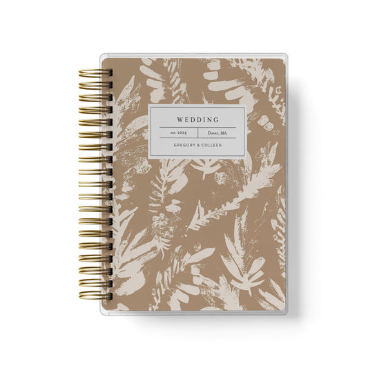Our neutral boho leaf design is the best option for budget friendly wedding planner books