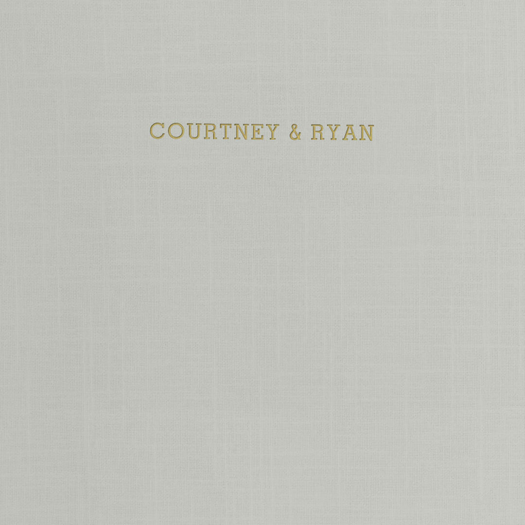 Our wedding binders are the perfect wedding planning tool, shown with the couple's first names on the cover