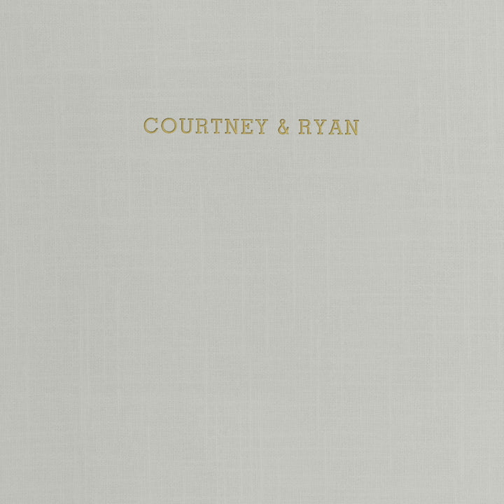 Our wedding binders are the perfect wedding planning tool, shown with the couple's first names on the cover