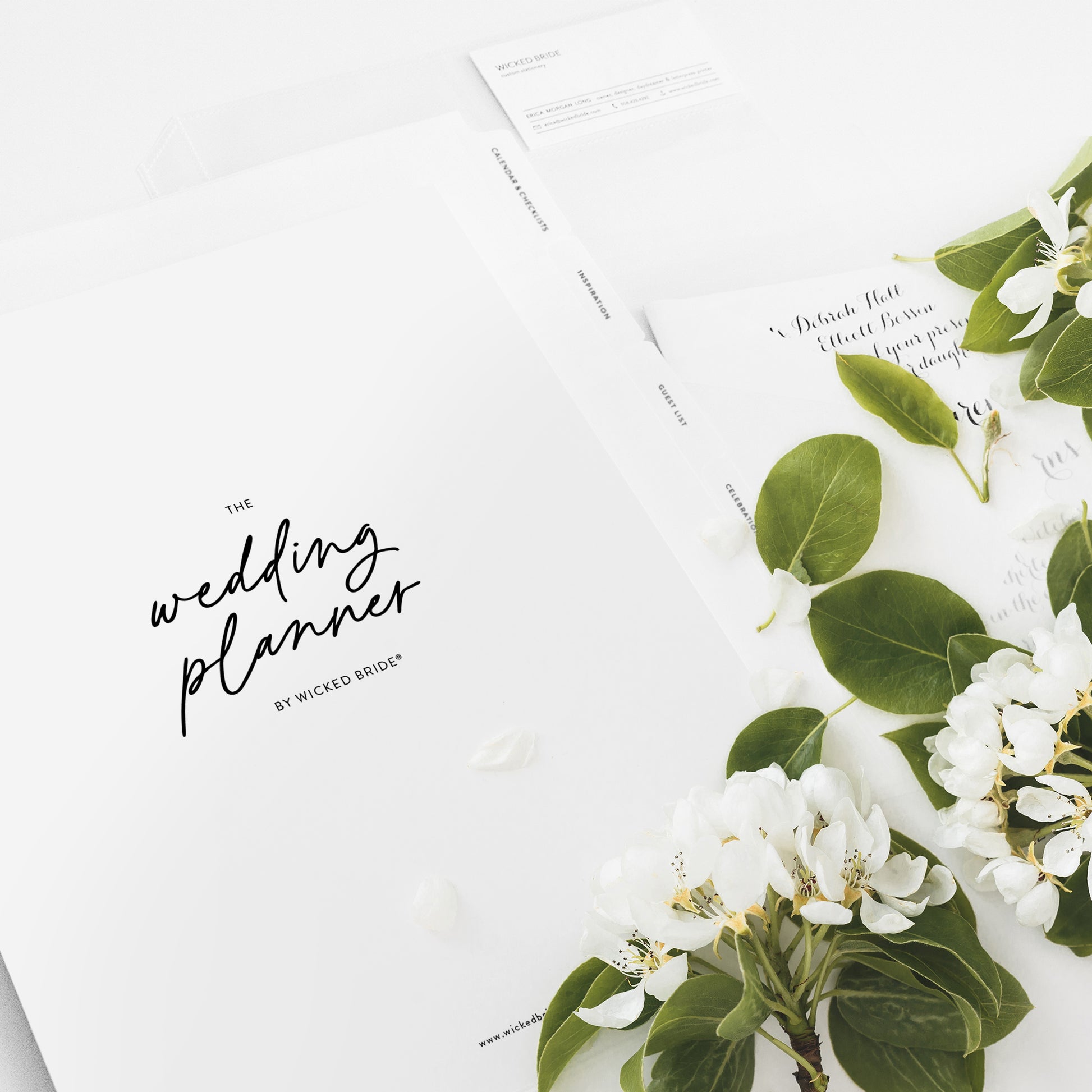 Wedding planning binder kit includes over 100 printed pages, 10 index tabs, a business card page and plastic binder pocket